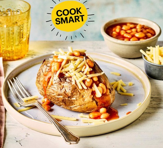 Air fryer recipes for kids air fryer baked potato filled with baked beans and topped with cheese