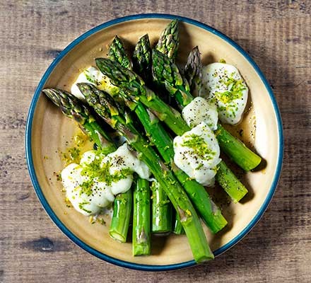 A serving of cooked asparagus on a plate