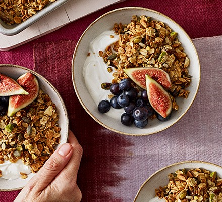 Bowl of granola with yogurt and figs