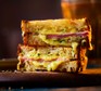 Air-fryer cheese & ham toastie Two slices of air-fryer cheese & ham toastie stacked together