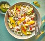Chicken, mango & noodle salad A large chicken, mango & noodle salad