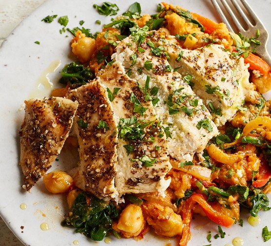 Whole-food, scratch-cooking meal plan A plate of za'atar-coated chicken on top of smashed chickpeas