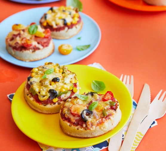 Crumpet pizzas on plates