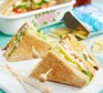 Egg & cress club sandwich Egg & cress club sandwiches cut into triangles