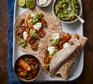 Halloumi fajitas with soured cream and guacamole