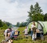 Family camping in woodland