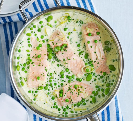 10 freezer essentials and recipe ideas Salmon with peas and broad beans in a cream sauce in a pan