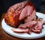 Slow cooker gammon in cola Slow cooker gammon served on a plate