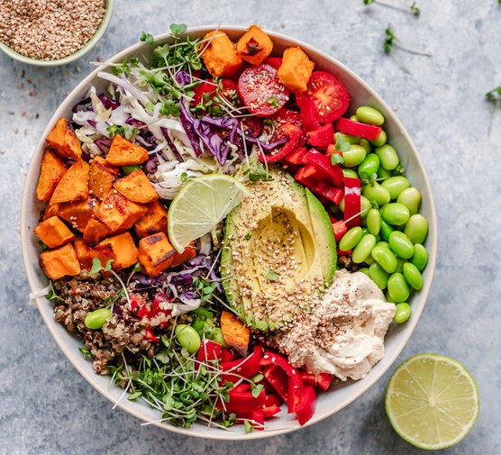 Colourful vegan bowl with quinoa and sweet potato