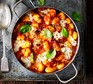 Midweek meal recipes Chorizo and mozzarella gnocchi bake in a casserole dish