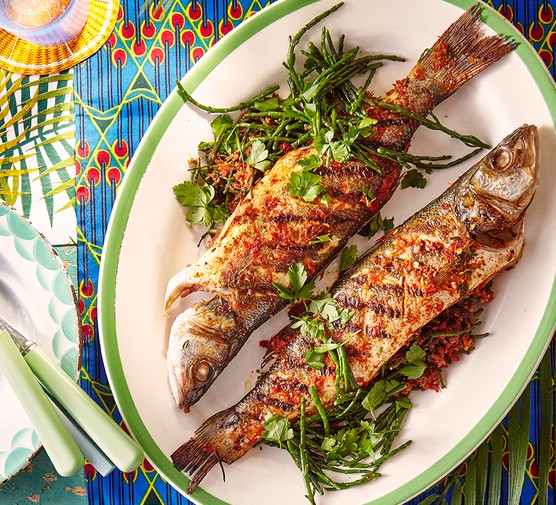 Two grilled fish with samphire