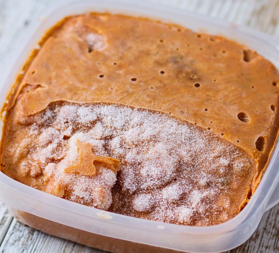 Container with freezer burned food