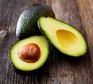 Avocado on wooden table