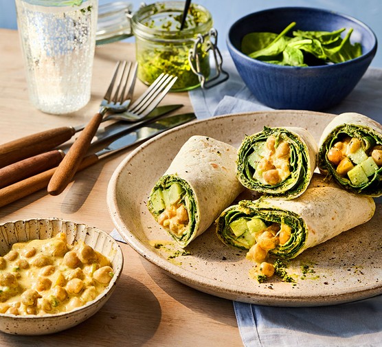 Several mango & chickpea coronation wraps with coriander cashew chutney