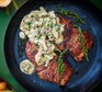 A serving of sirloin steak & creamy mushroom sauce