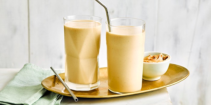 Peanut butter smoothie in two glasses