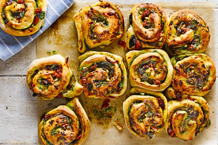 Cheese & pesto whirls Tear-and-share Chelsea buns filled with Pesto, tomato and mozzarella