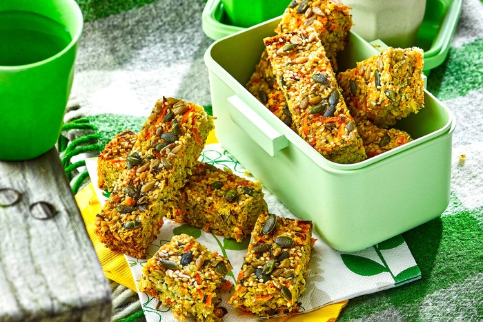 Seeded cheese and chive flapjacks Green boxes filled with seeded flapjack bars