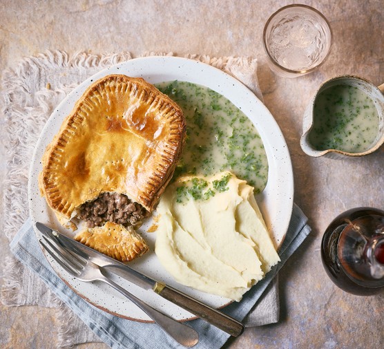 Plate of pie, mash & liquor on a plate
