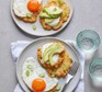 Potato fritters Potato fritters topped with egg, soured cream and avocado