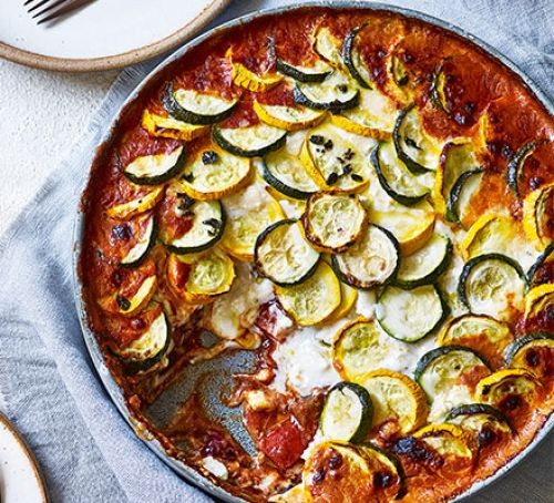 Baked ratatouille dish topped with cheese