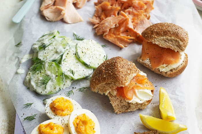 Salmon picnic platter Spread of smoked salmon, cucumber, eggs and rye bread