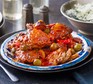 Slow cooker Spanish chicken Slow cooker Spanish chicken on a rustic plate