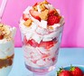 Strawberry cheesecake Eton mess Strawberry cheesecake Eton mess served in a dessert glass