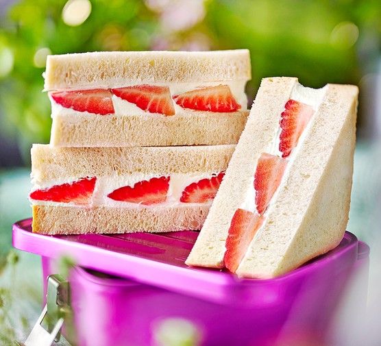 Strawberry sandos in a lunchbox