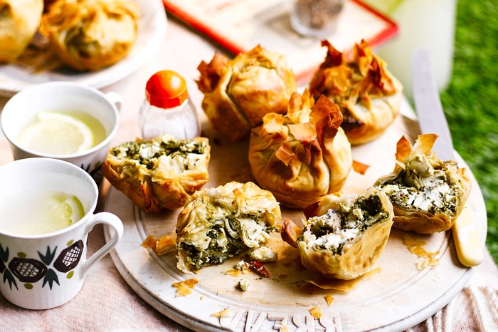 Summer herb & feta pies Small filo pies on a circular platter
