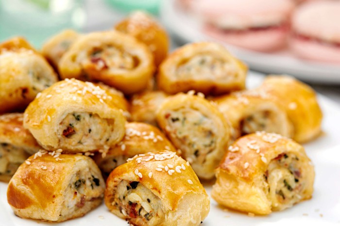Summer sausage rolls Small sausage rolls with sesame seeds on top