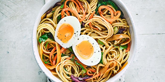 Bowl of noodles with vegetables and eggs