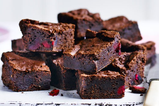 Vegan cherry brownies A pile of cherry chocolate brownies stacked up on each other