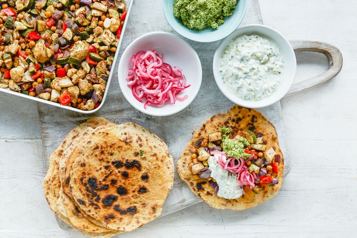Vegetable wraps Round flatbreads with a selection of dips and vegetarian filling