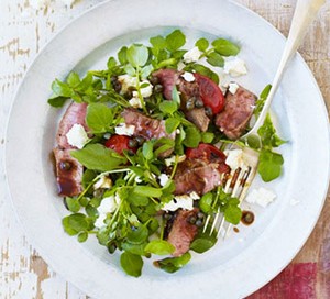 Lamb tagliata with watercress & tomatoes