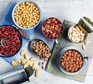 Tins and dishes of pulses and beans
